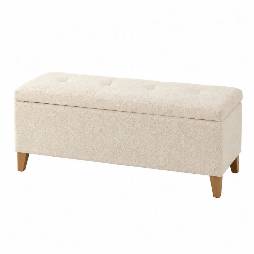 Panca contenitore imbottita in tessuto bouclé poliestere beige con struttura in MDF e gambe in legno massello 110 x 45 x 45 cm